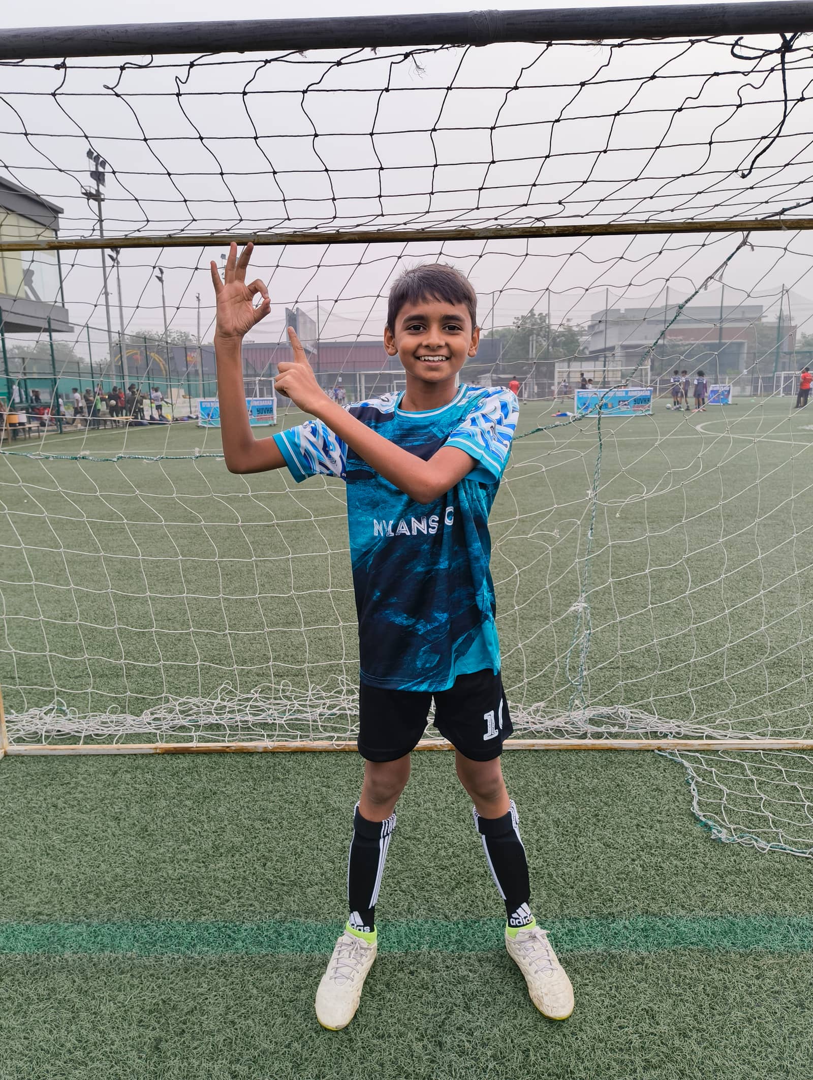Player Teal Kit Ok Sign